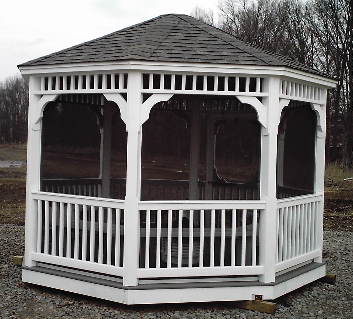 White vinyl octagon screened gazebo.