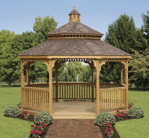 Natural cedar octagon wood gazebo with a cupola.